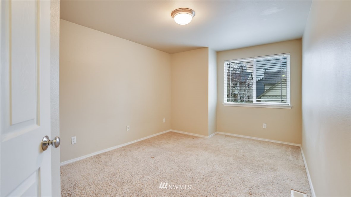 6725 Southeast 3rd Street Renton, WA 98059 - Photo 18 of 32 an empty room with windows