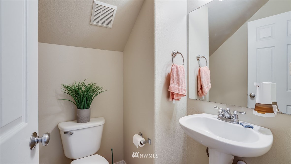 6725 Southeast 3rd Street Renton, WA 98059 - Photo 26 of 32 a bathroom with a sink toilet and a mirror