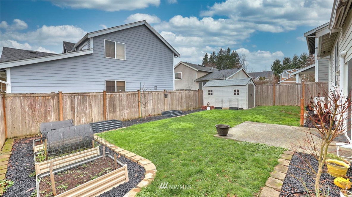 6725 Southeast 3rd Street Renton, WA 98059 - Photo 29 of 32 a view of a house with a yard and furniture