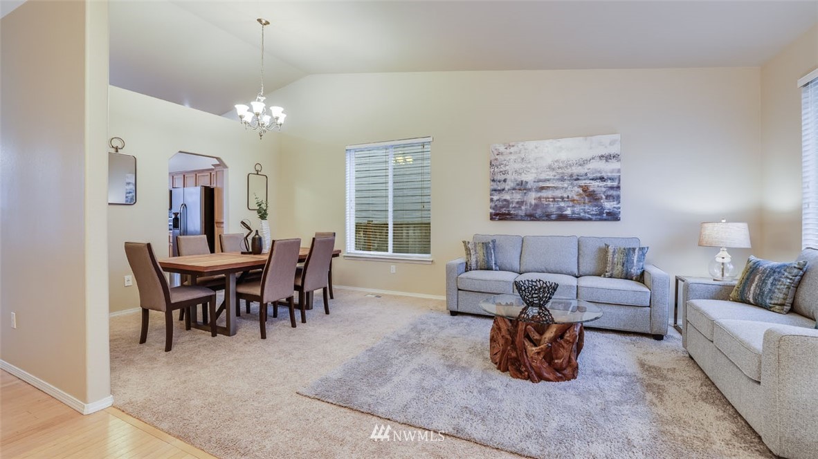 6725 Southeast 3rd Street Renton, WA 98059 - Photo 4 of 32 a living room with furniture chandelier and a chandelier