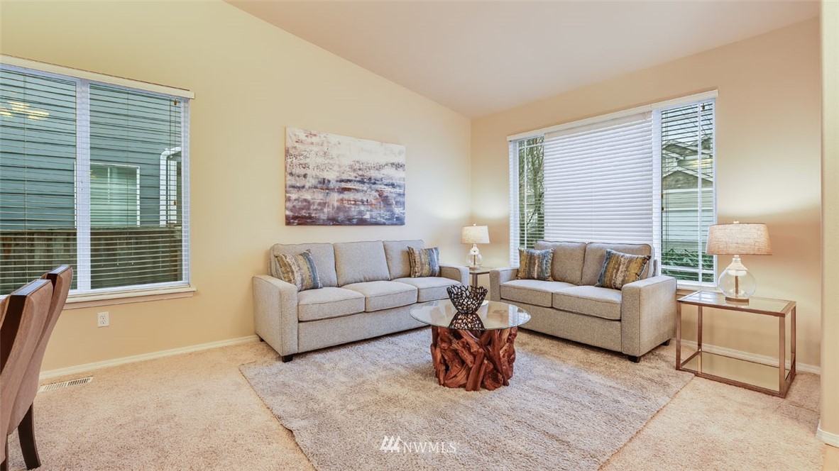 6725 Southeast 3rd Street Renton, WA 98059 - Photo 5 of 32 a living room with furniture and a large window