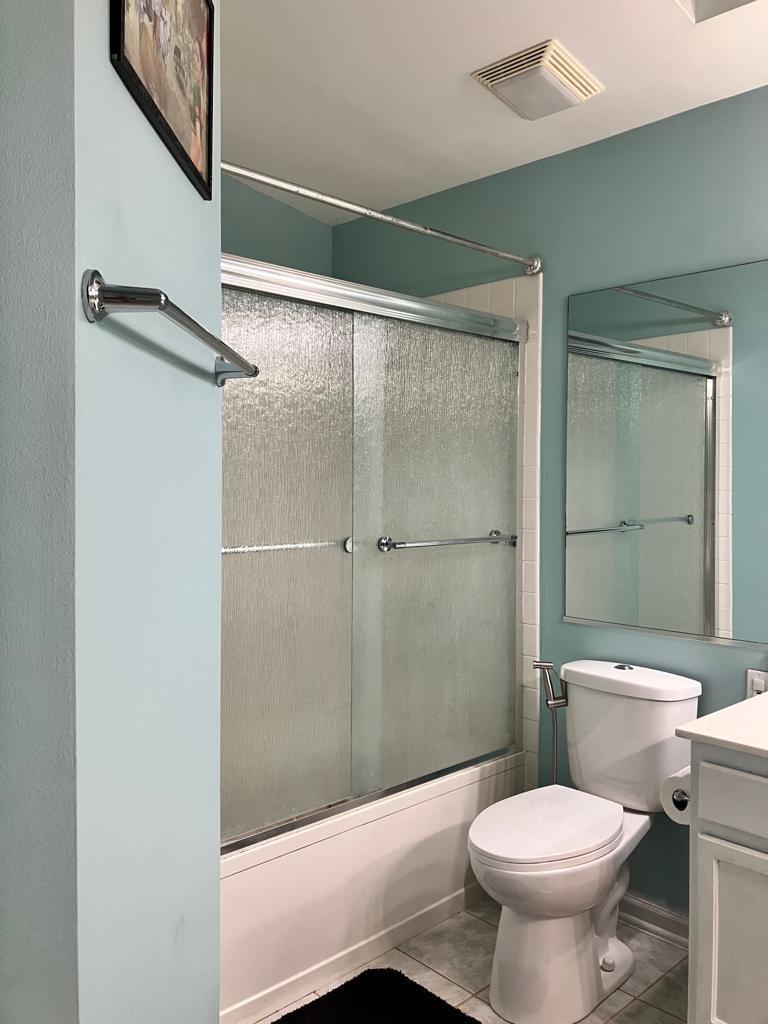 Undisclosed Address Round Lake Beach, IL 60073 - Photo 14 of 28 a bathroom with a toilet and a shower