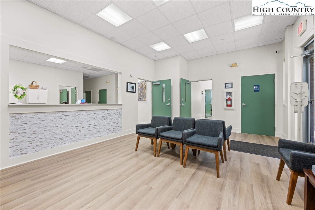 610 State Farm Road, Unit 3 Boone, NC 28607 - Photo 13 of 49 a living room with furniture and wooden floor