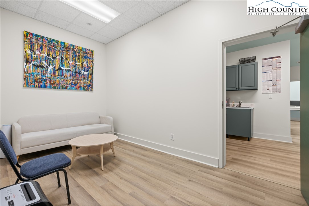 610 State Farm Road, Unit 3 Boone, NC 28607 - Photo 14 of 49 a living room with furniture and a wooden floor