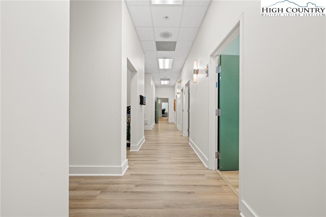 610 State Farm Road, Unit 3 Boone, NC 28607 - Photo 15 of 49 a view of a hallway with wooden floor