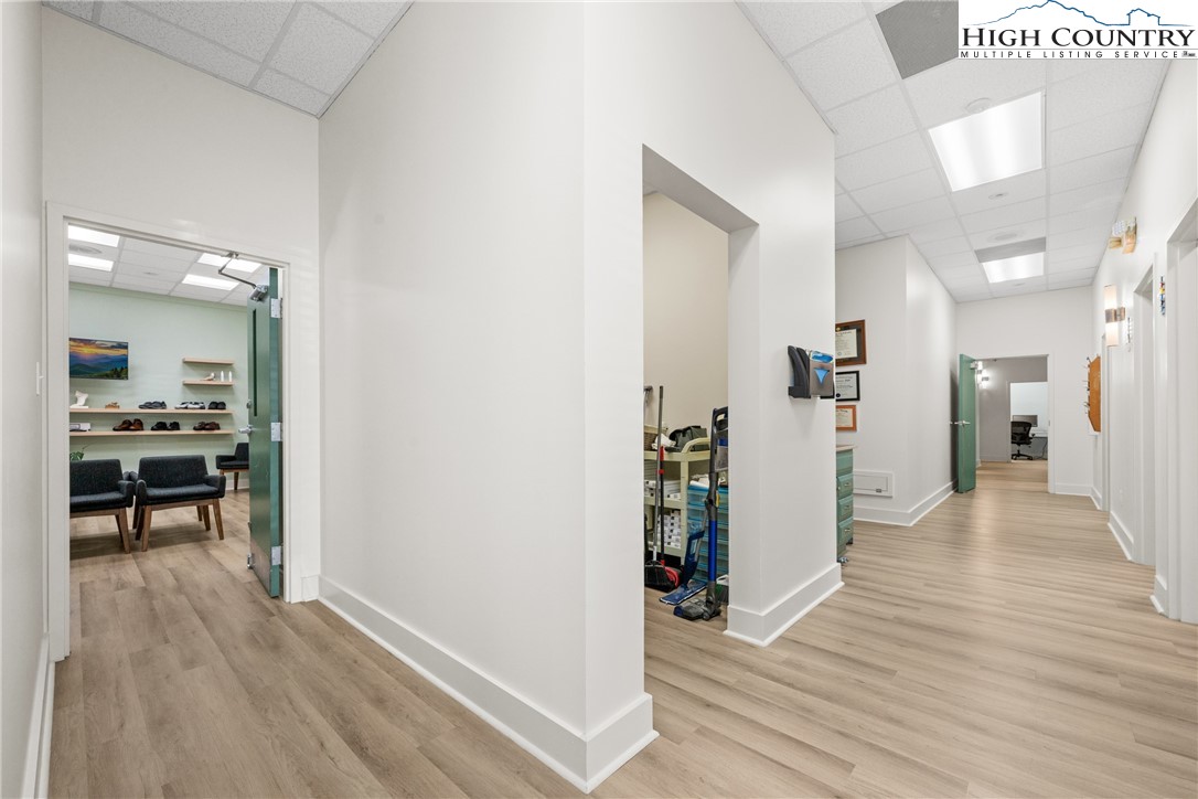 610 State Farm Road, Unit 3 Boone, NC 28607 - Photo 16 of 49 a view of a living room with furniture and wooden floor