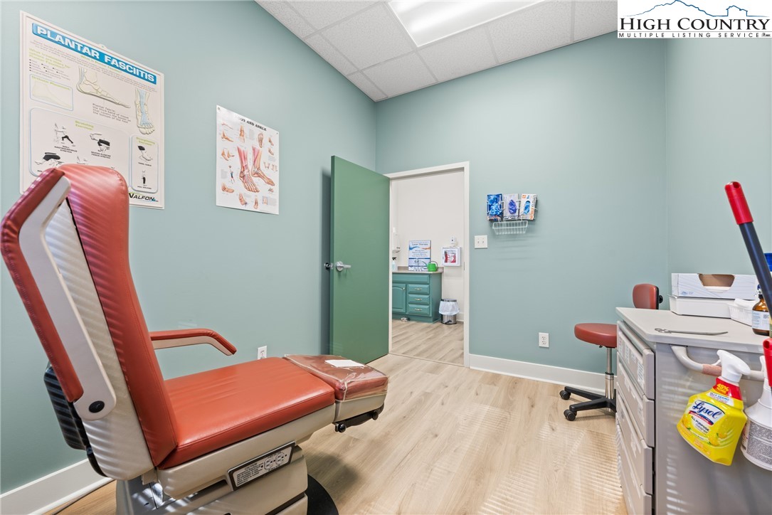 610 State Farm Road, Unit 3 Boone, NC 28607 - Photo 20 of 49 a room with furniture and a wooden floor