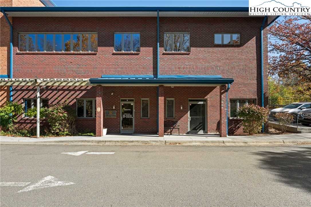 610 State Farm Road, Unit 3 Boone, NC 28607 - Photo 2 of 49 a view of a house with large windows
