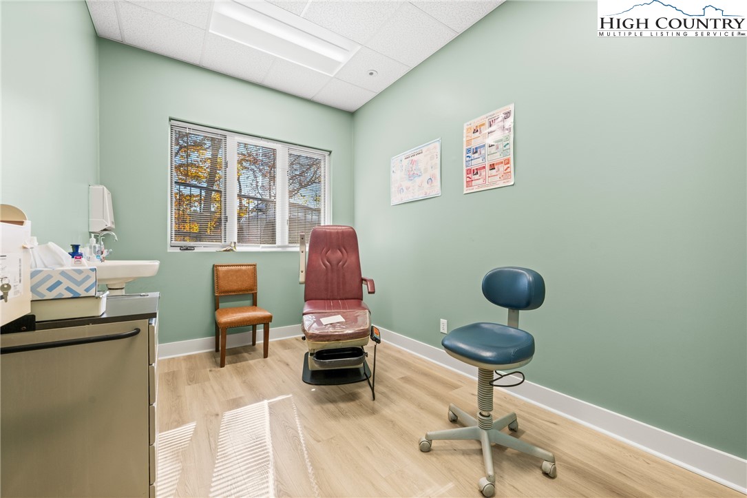 610 State Farm Road, Unit 3 Boone, NC 28607 - Photo 22 of 49 a workspace with furniture and window