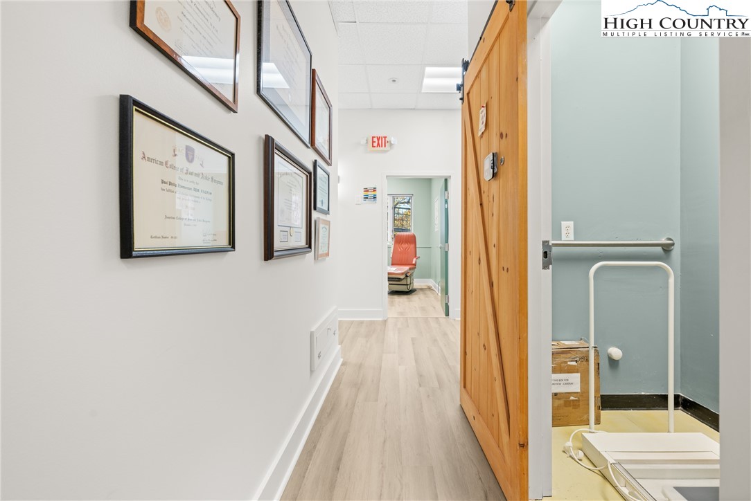 610 State Farm Road, Unit 3 Boone, NC 28607 - Photo 26 of 49 a view of a hallway with wooden floor and staircase