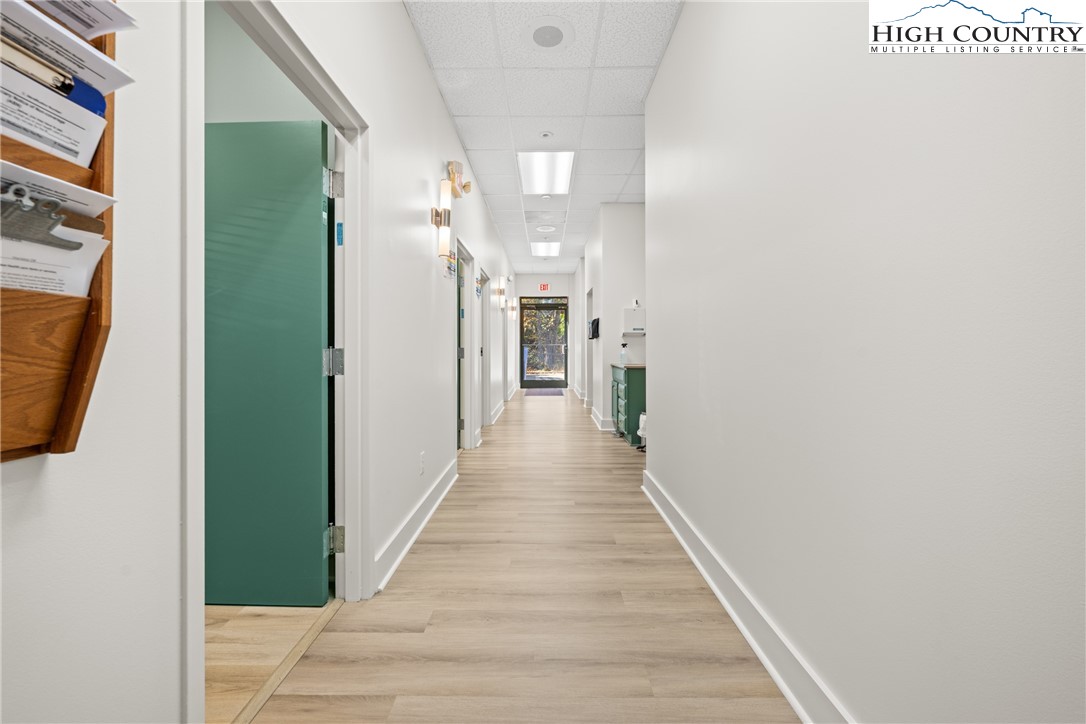 610 State Farm Road, Unit 3 Boone, NC 28607 - Photo 29 of 49 a view of a hallway with wooden floor and staircase