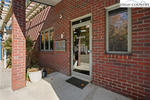 a front view of a house with outdoor space