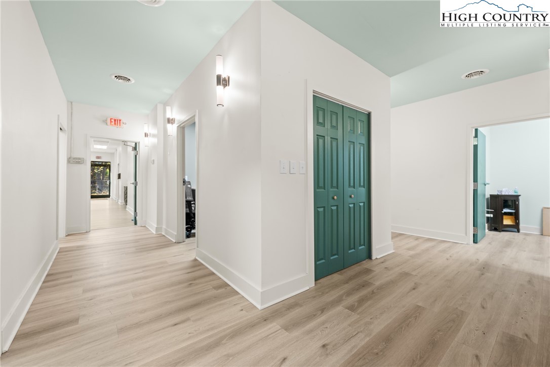 610 State Farm Road, Unit 3 Boone, NC 28607 - Photo 32 of 49 a view of a hallway with wooden floor