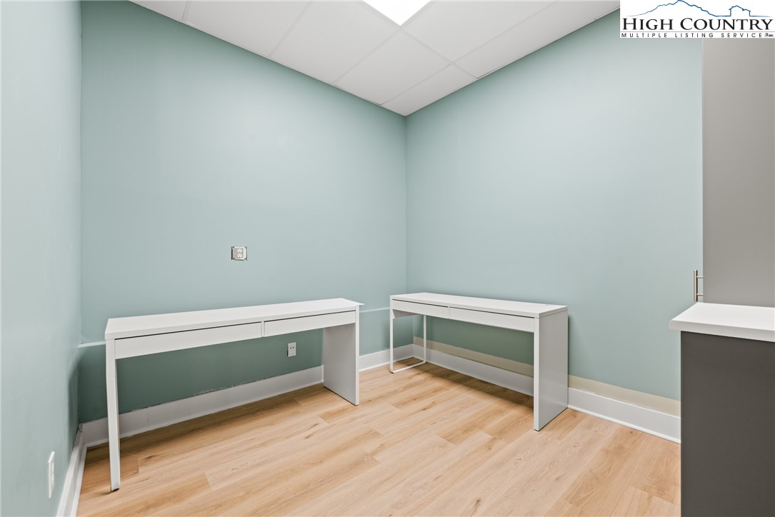 610 State Farm Road, Unit 3 Boone, NC 28607 - Photo 38 of 49 a view of room with wooden floor and fan