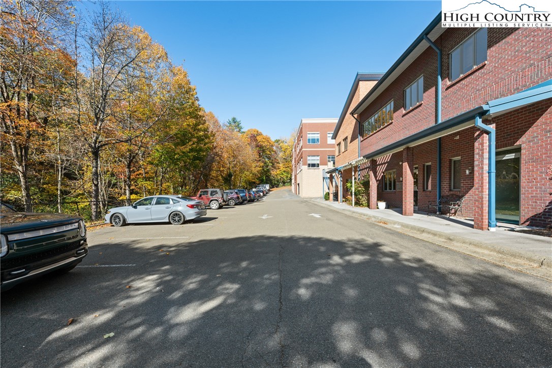 610 State Farm Road, Unit 3 Boone, NC 28607 - Photo 4 of 49 a view of street with parked cars