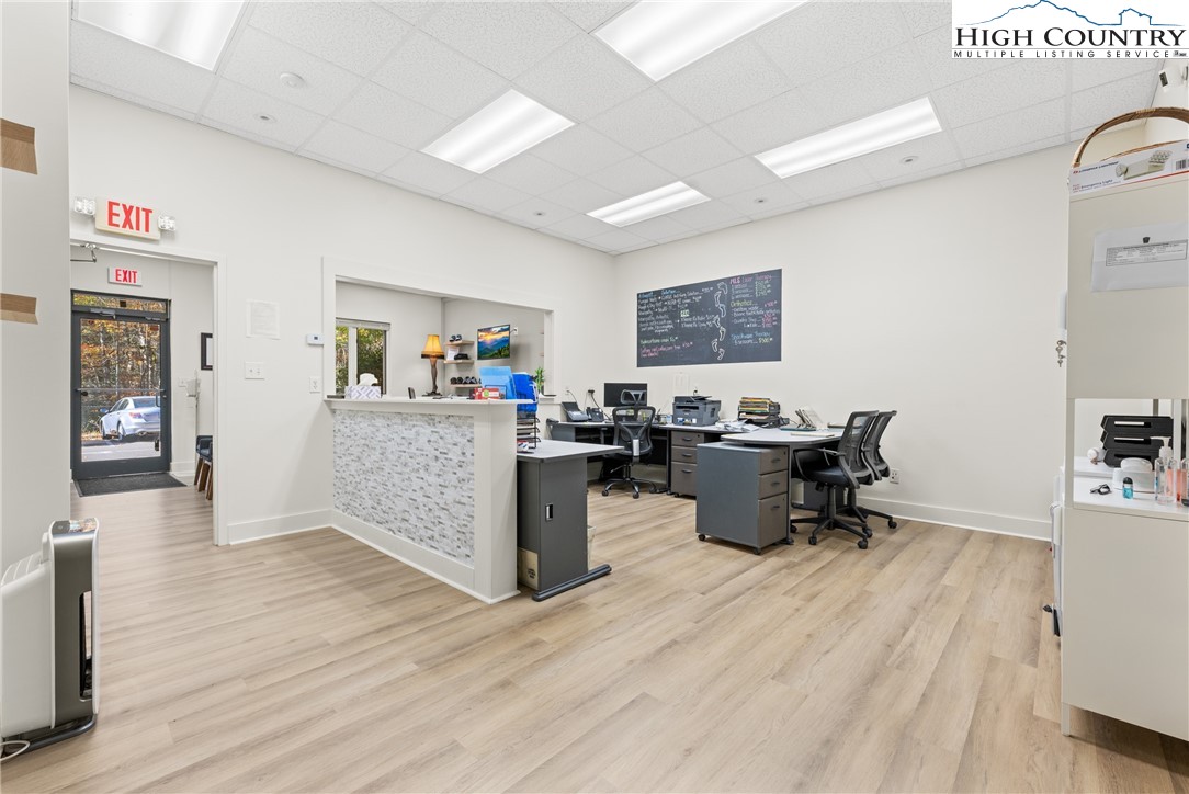 610 State Farm Road, Unit 3 Boone, NC 28607 - Photo 43 of 49 a living room with furniture and wooden floor