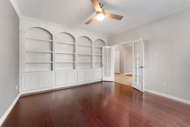 a view of a livingroom with wooden floor