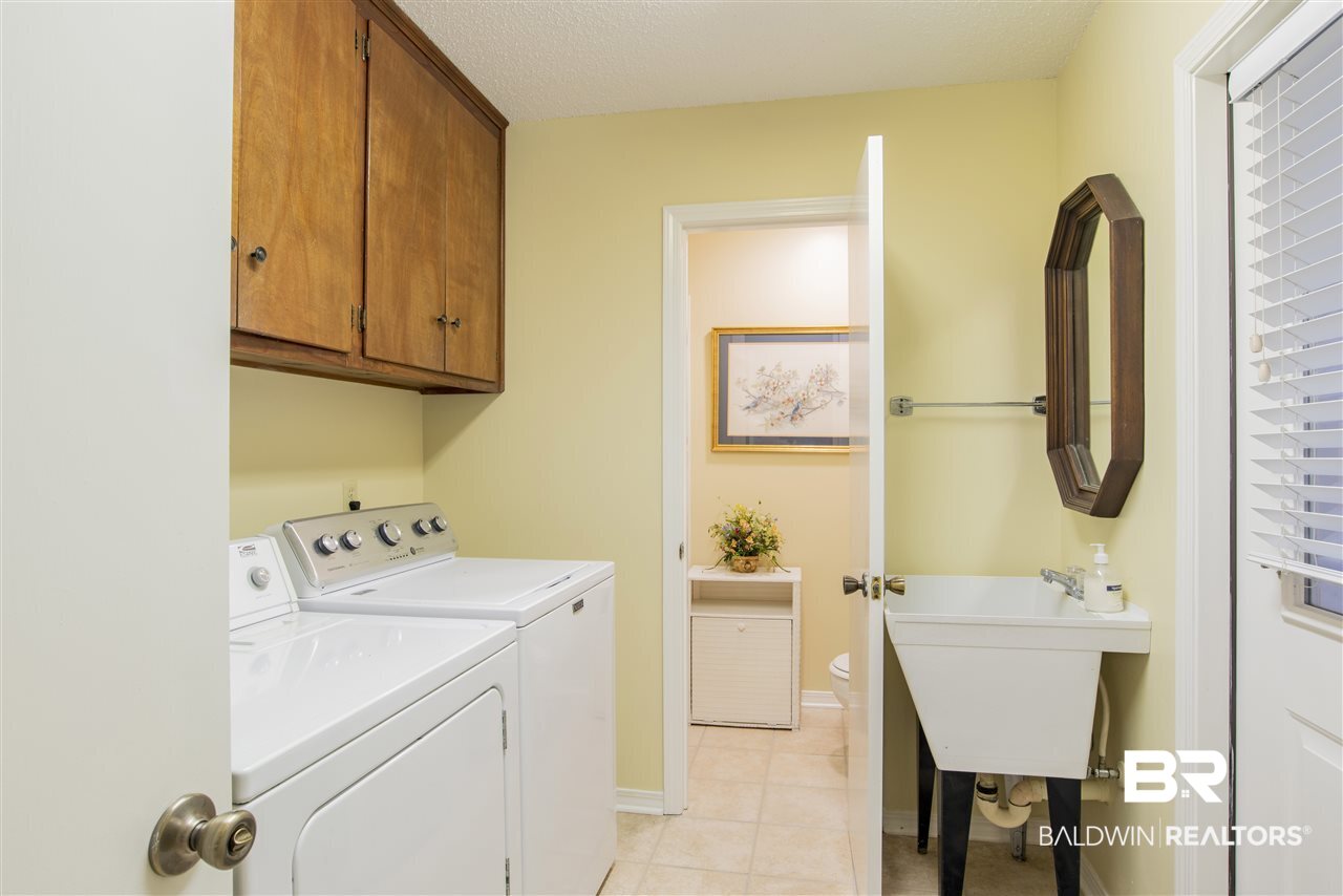 113 Fernway Drive Atmore, AL 36502 - Photo 22 of 25 Laundry/Half Bath