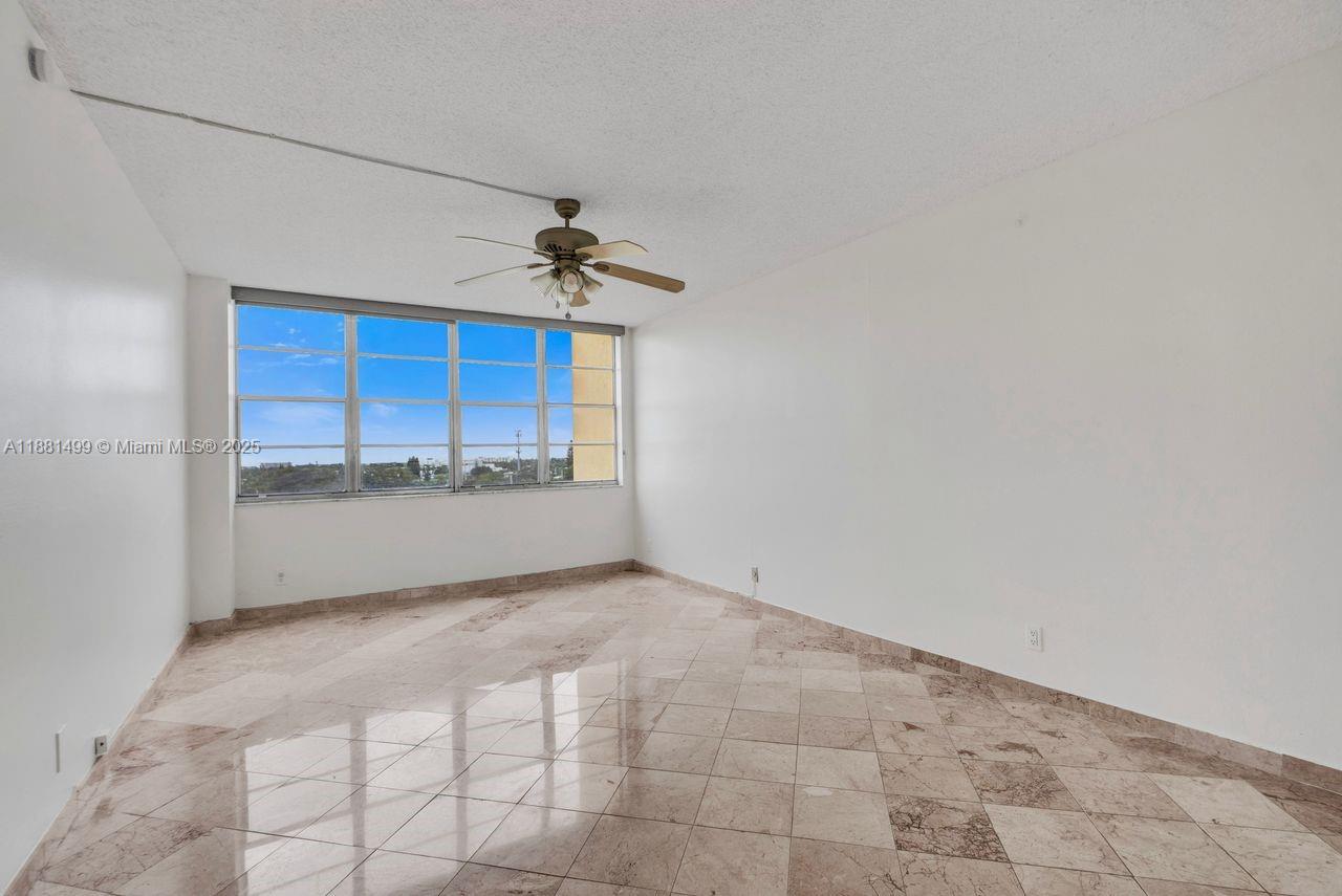 2025 Northeast 164th Street, Unit 716 North Miami Beach, FL 33162 - Photo 33 of 39 a view of an empty room
