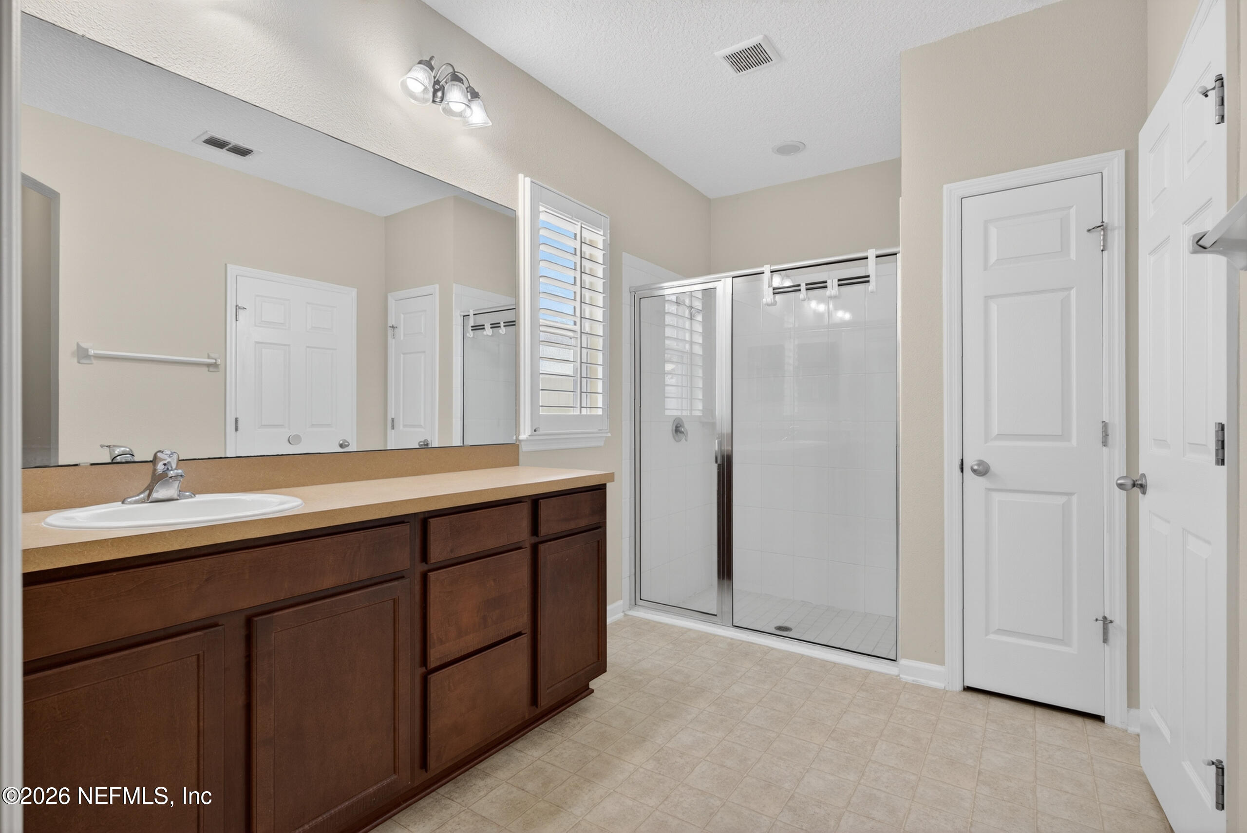 234 Taylor Ridge Avenue Ponte Vedra, FL 32081 - Photo 15 of 27 a bathroom with double sink and a mirror