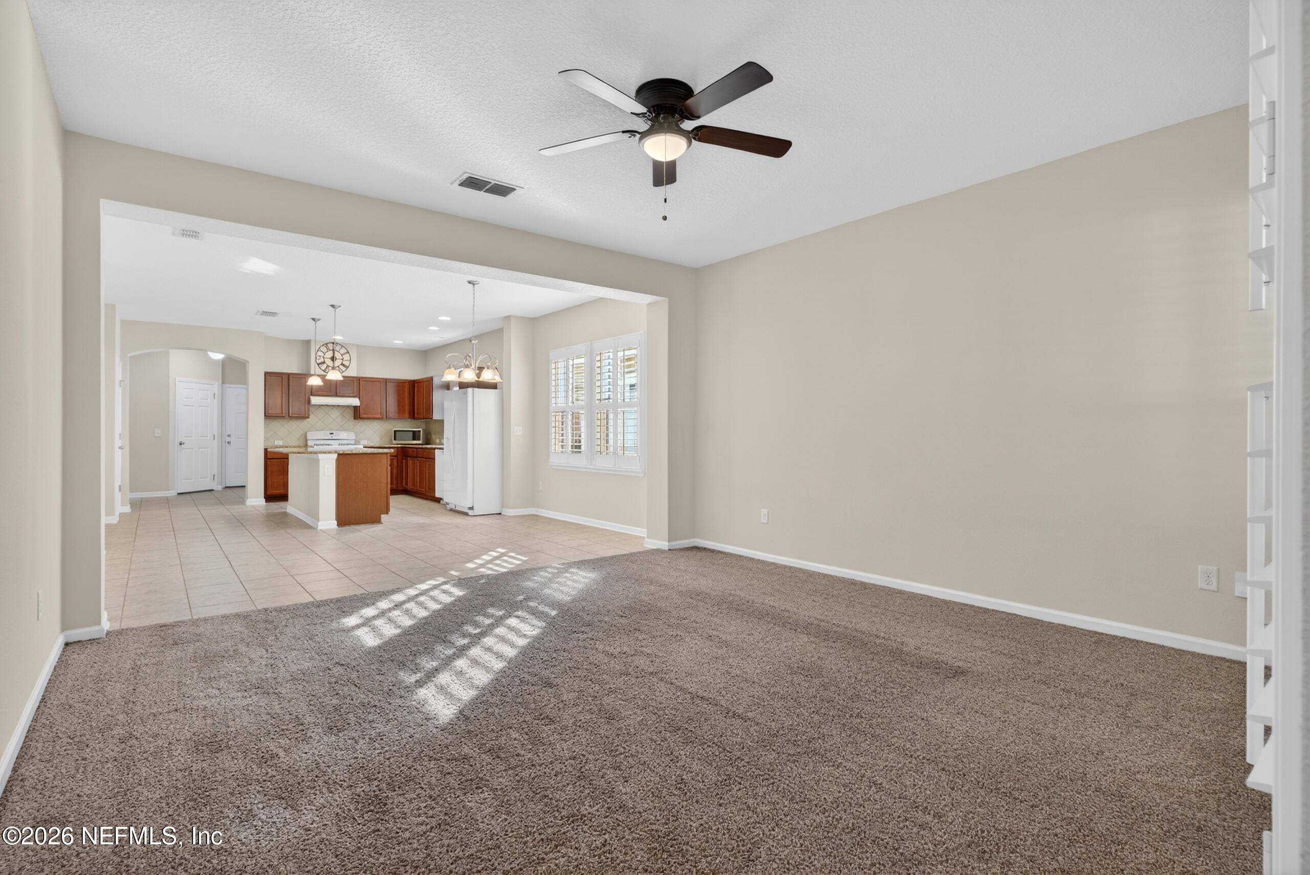 234 Taylor Ridge Avenue Ponte Vedra, FL 32081 - Photo 6 of 27 a view of a livingroom with a kitchen