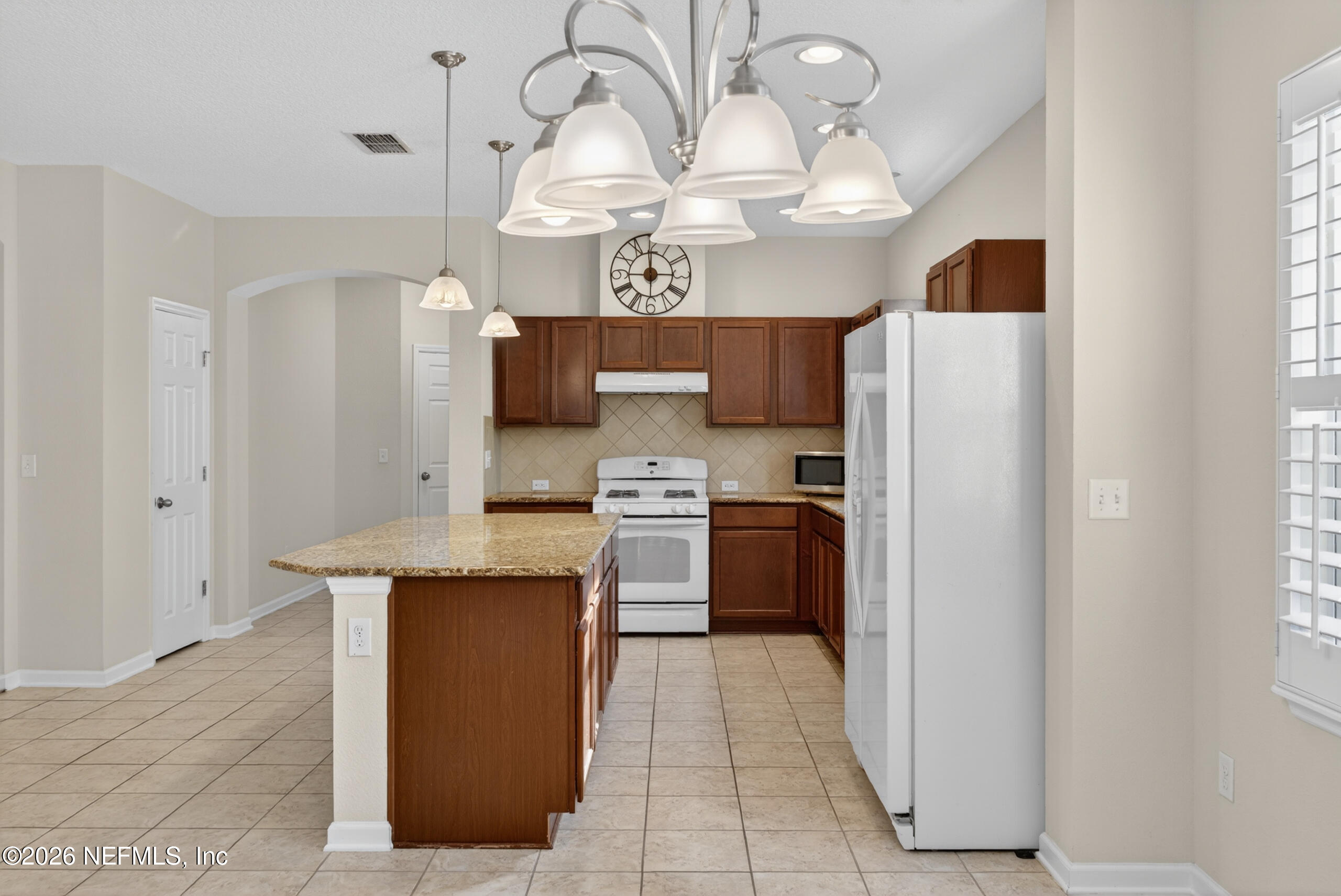 234 Taylor Ridge Avenue Ponte Vedra, FL 32081 - Photo 8 of 27 a kitchen with stainless steel appliances granite countertop a refrigerator a oven and a sink