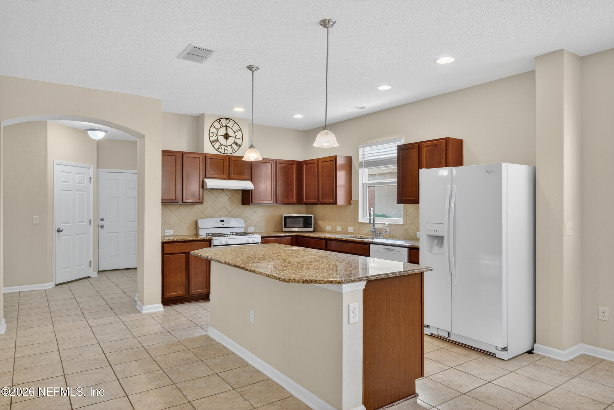234 Taylor Ridge Avenue Ponte Vedra, FL 32081 - Photo 9 of 27 a kitchen with stainless steel appliances granite countertop a refrigerator a sink a stove and a oven
