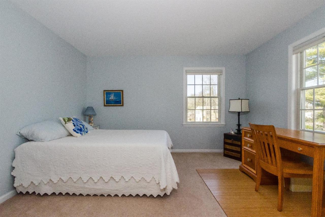 43 Converse Road Marion, MA 02738 - Photo 18 of 24 a bedroom with a bed and window