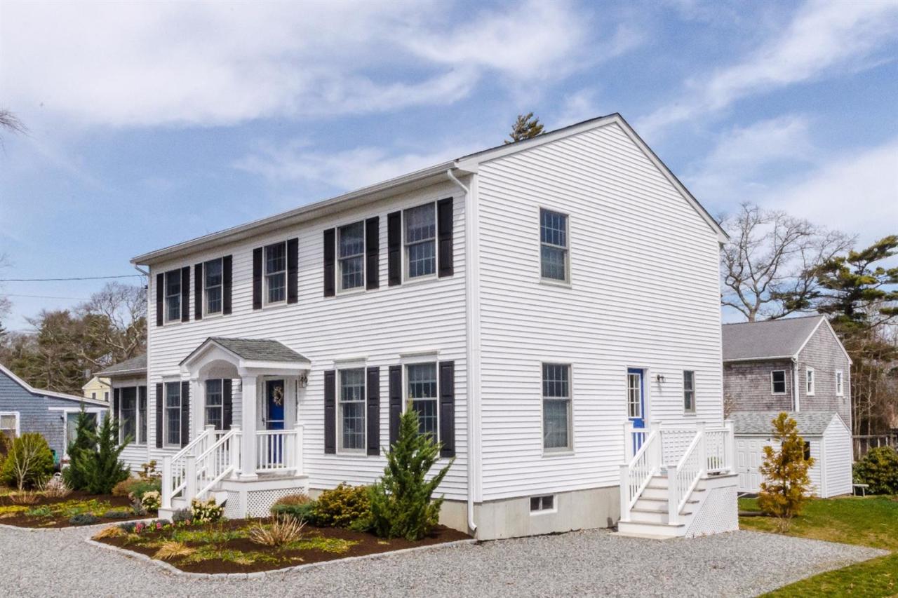 43 Converse Road Marion, MA 02738 - Photo 21 of 24 a front view of a house with a yard