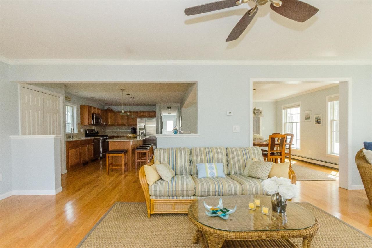 43 Converse Road Marion, MA 02738 - Photo 6 of 24 a living room with furniture and kitchen view