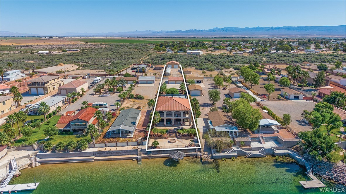 1084 Dike Road Mohave Valley, AZ 86440 - Photo 13 of 75 an aerial view of residential houses with outdoor space and ocean view
