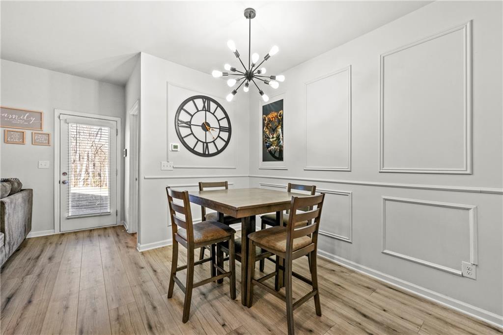 7492 Knoll Hollow Road Lithonia, GA 30058 - Photo 11 of 30 a view of a table and chairs in a room