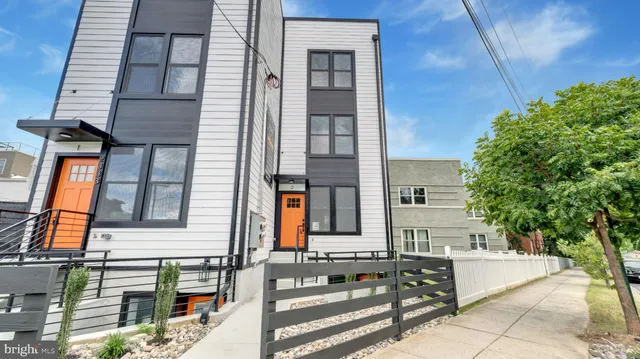 a view of a building with sitting area