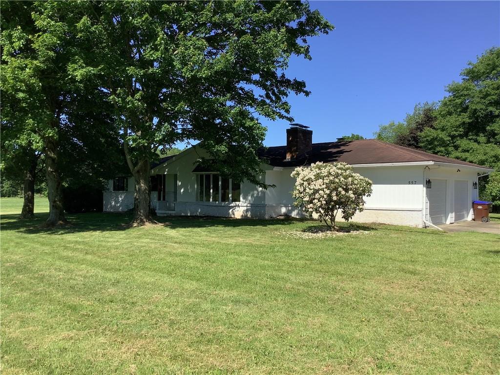 557 Hopper Road Transfer, PA 16154 - Photo 17 of 18 a front view of a house with a garden