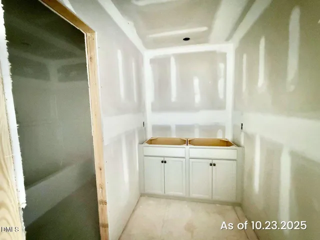 a bathroom with a sink a toilet and a shower