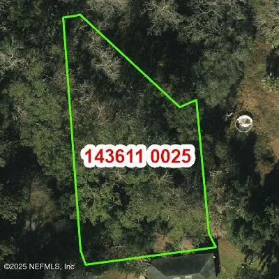 a street sign that is on a tree