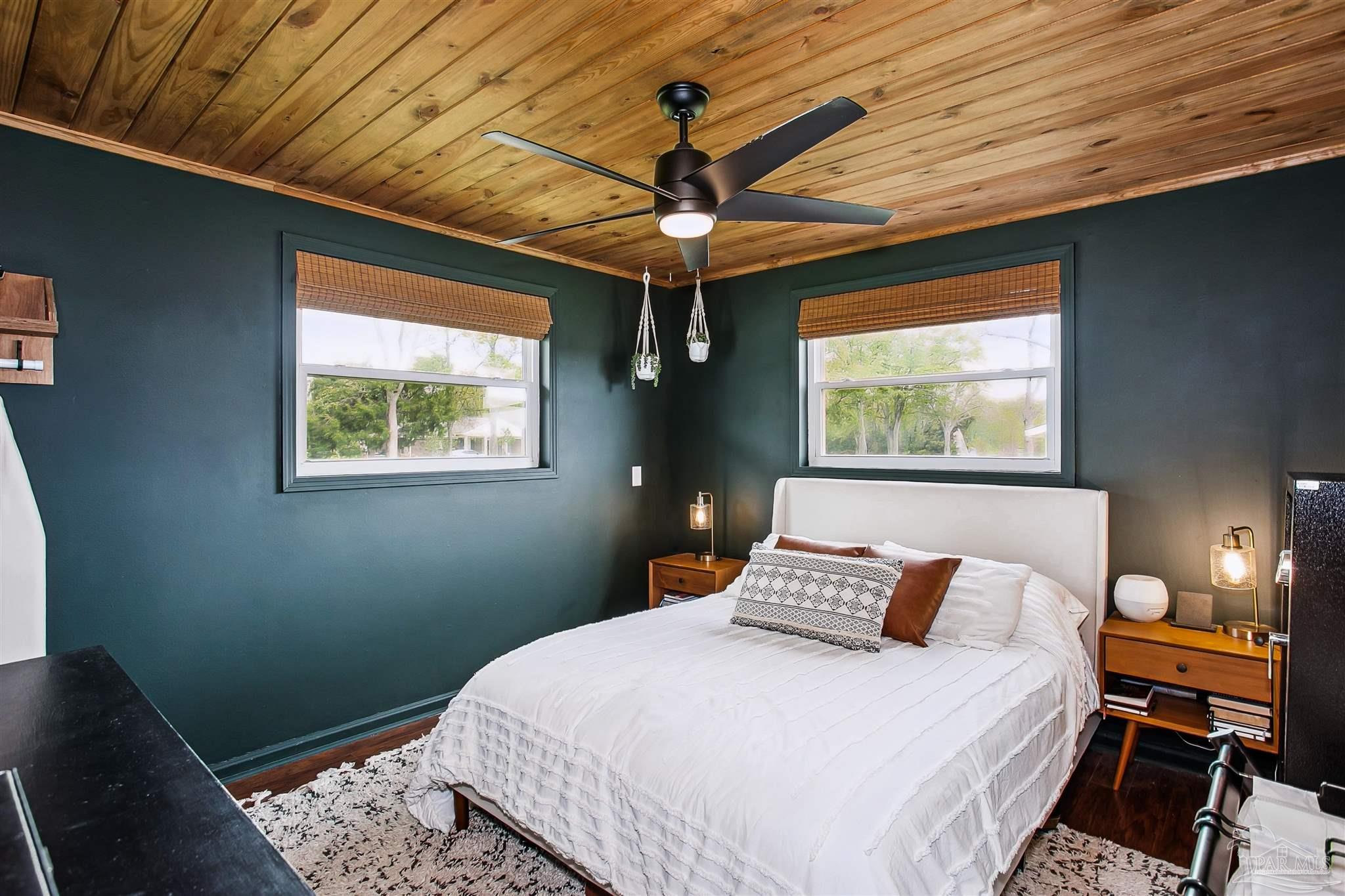 4075 Macks Road Century, FL 32535 - Photo 17 of 35 a bedroom with a bed and a window