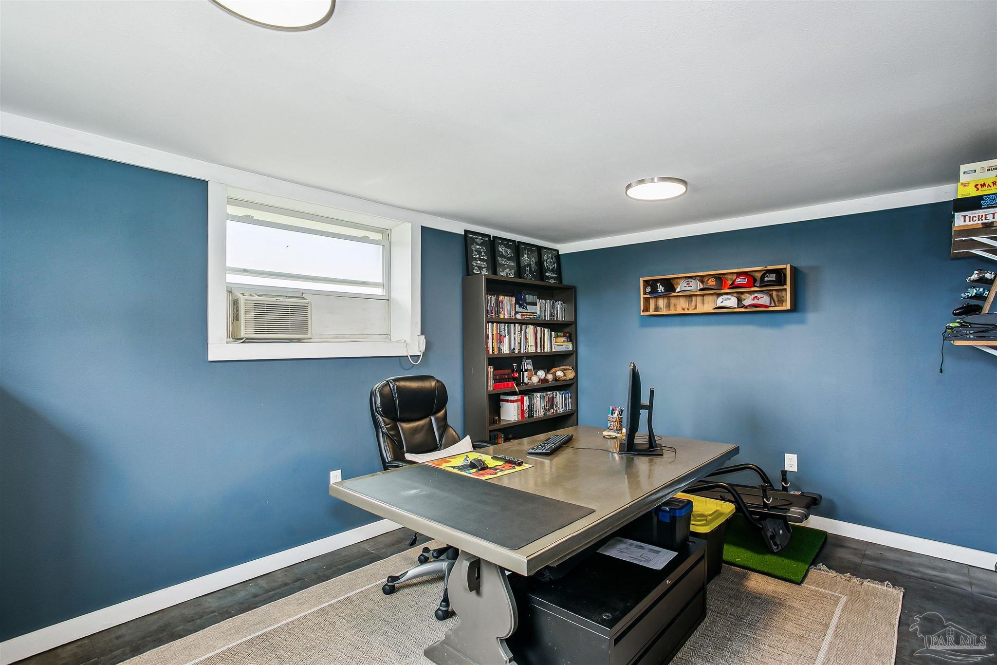 4075 Macks Road Century, FL 32535 - Photo 24 of 35 a workspace with furniture and window