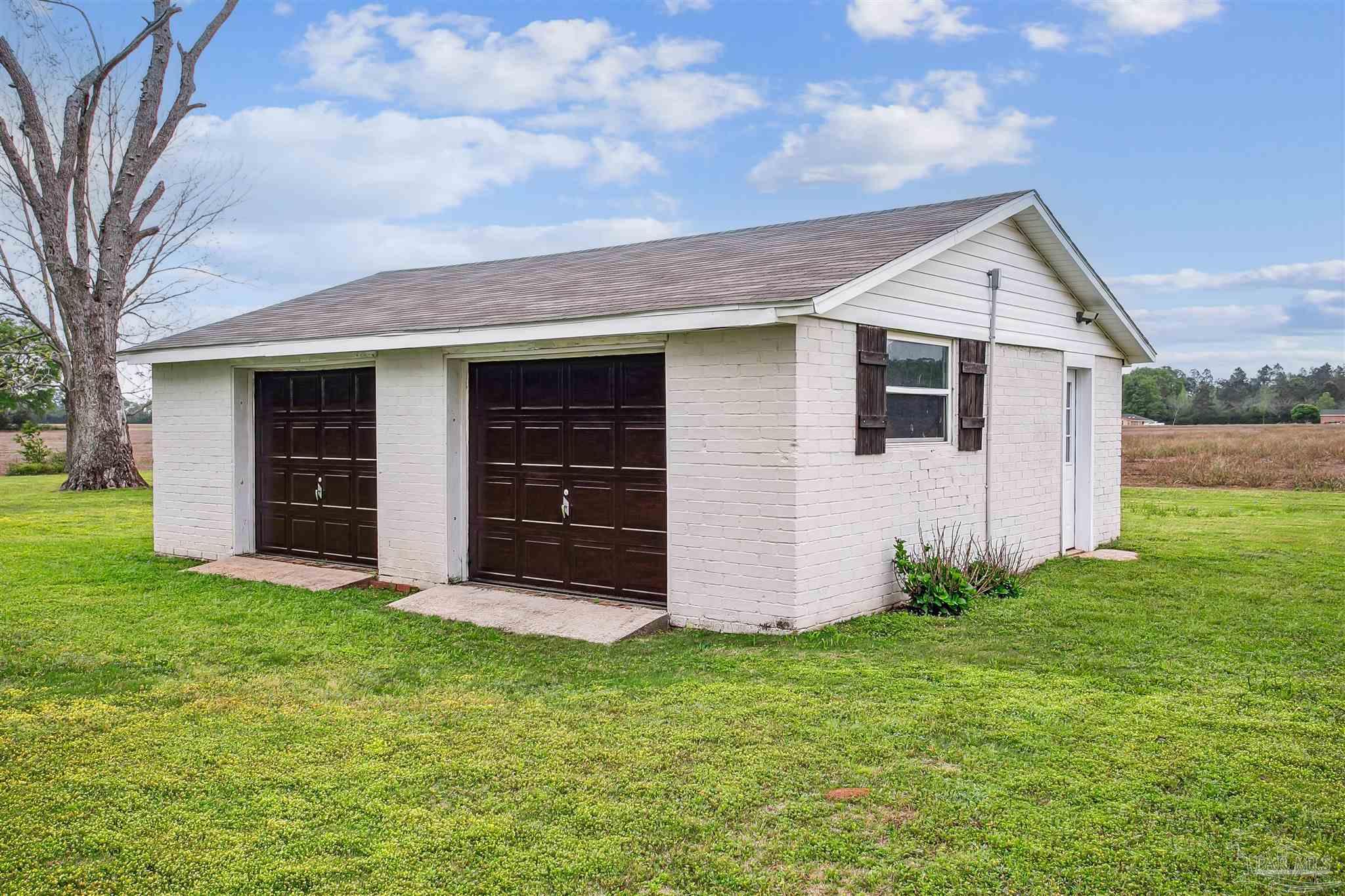 4075 Macks Road Century, FL 32535 - Photo 35 of 35 a view of a house with a yard