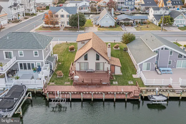 a aerial view of a house with outdoor space