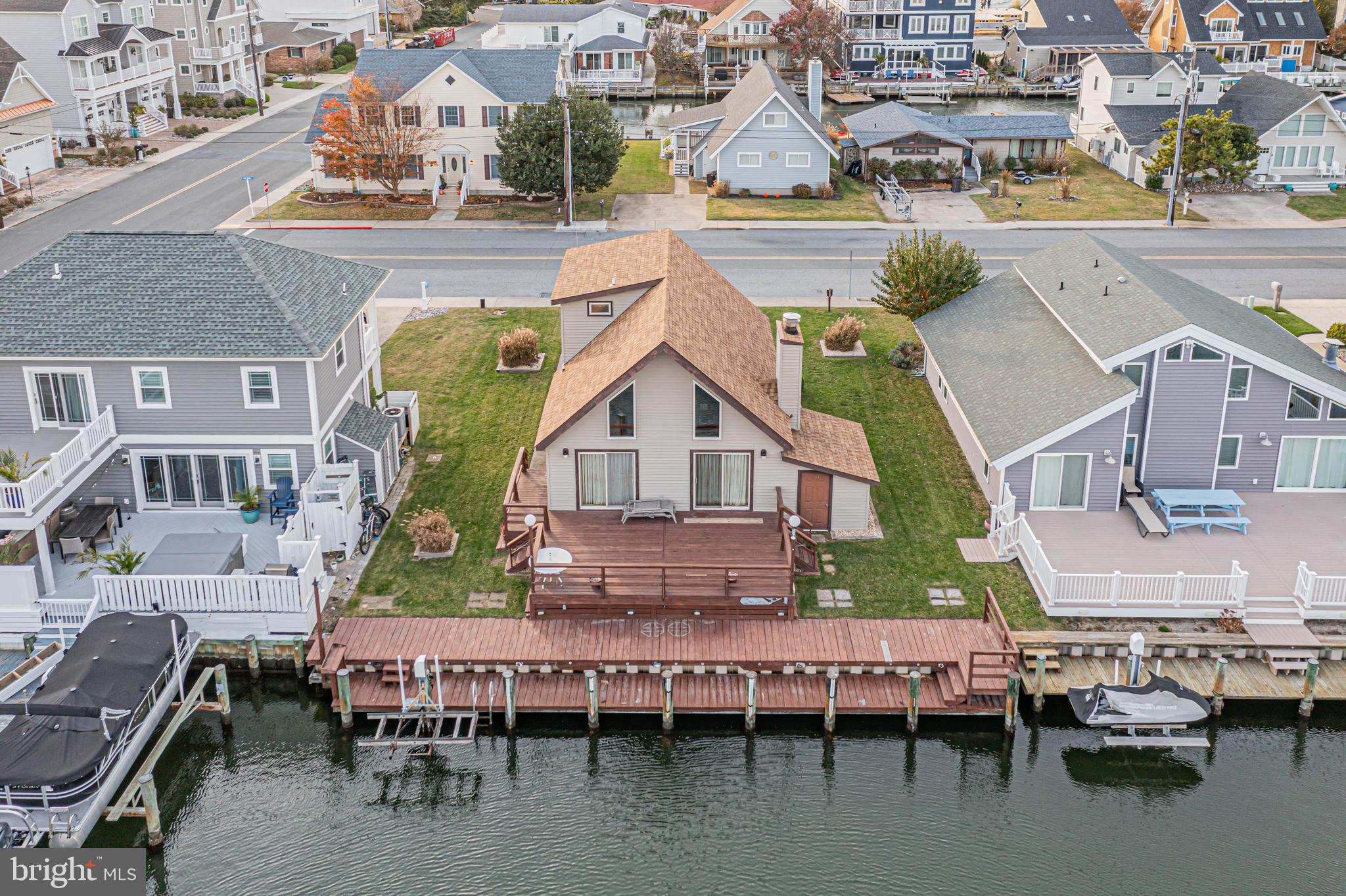 a aerial view of a house with outdoor space