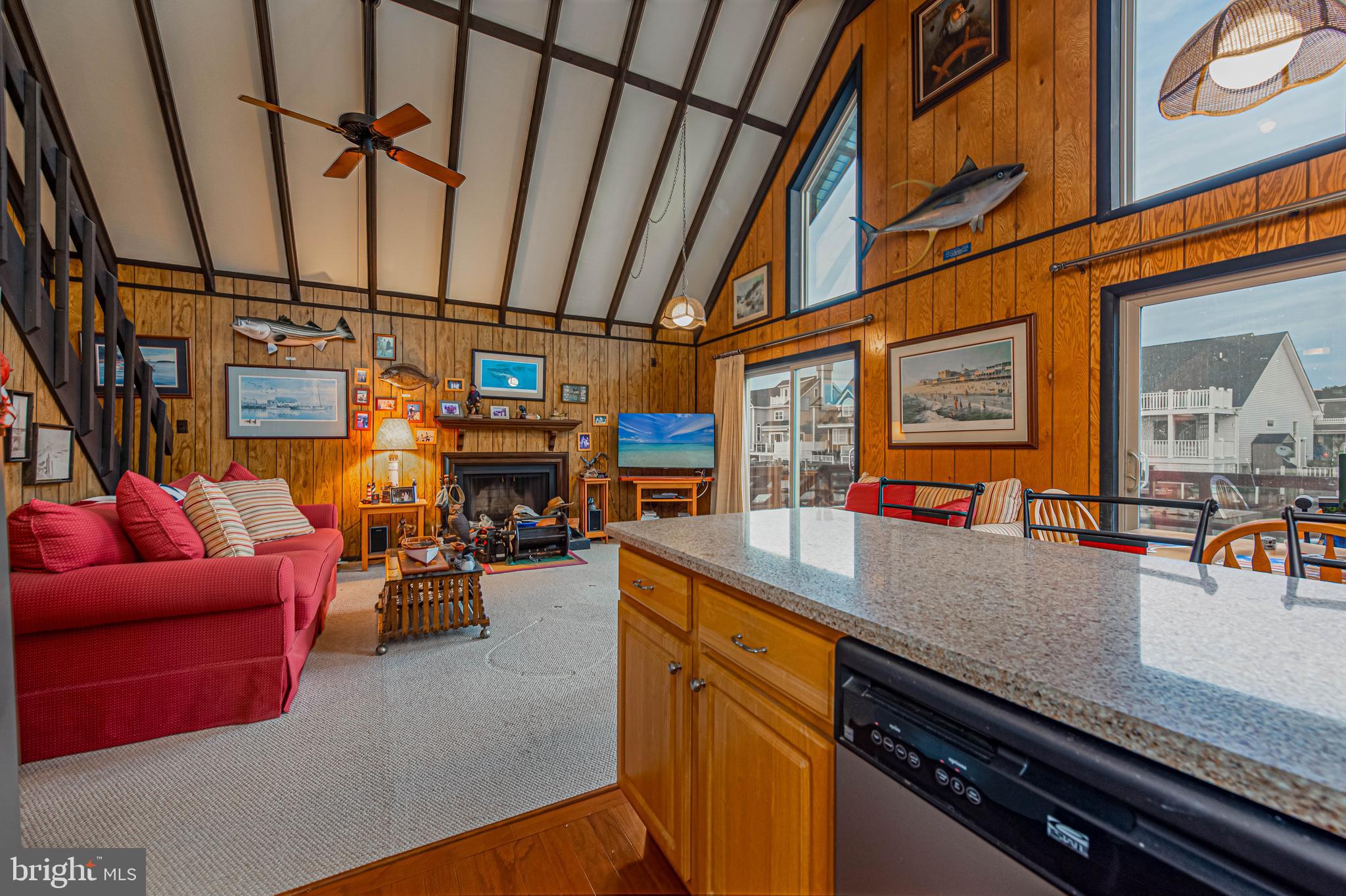 10602 Pine Needle Road Ocean City, MD 21842 - Photo 11 of 36 an outdoor living room with furniture