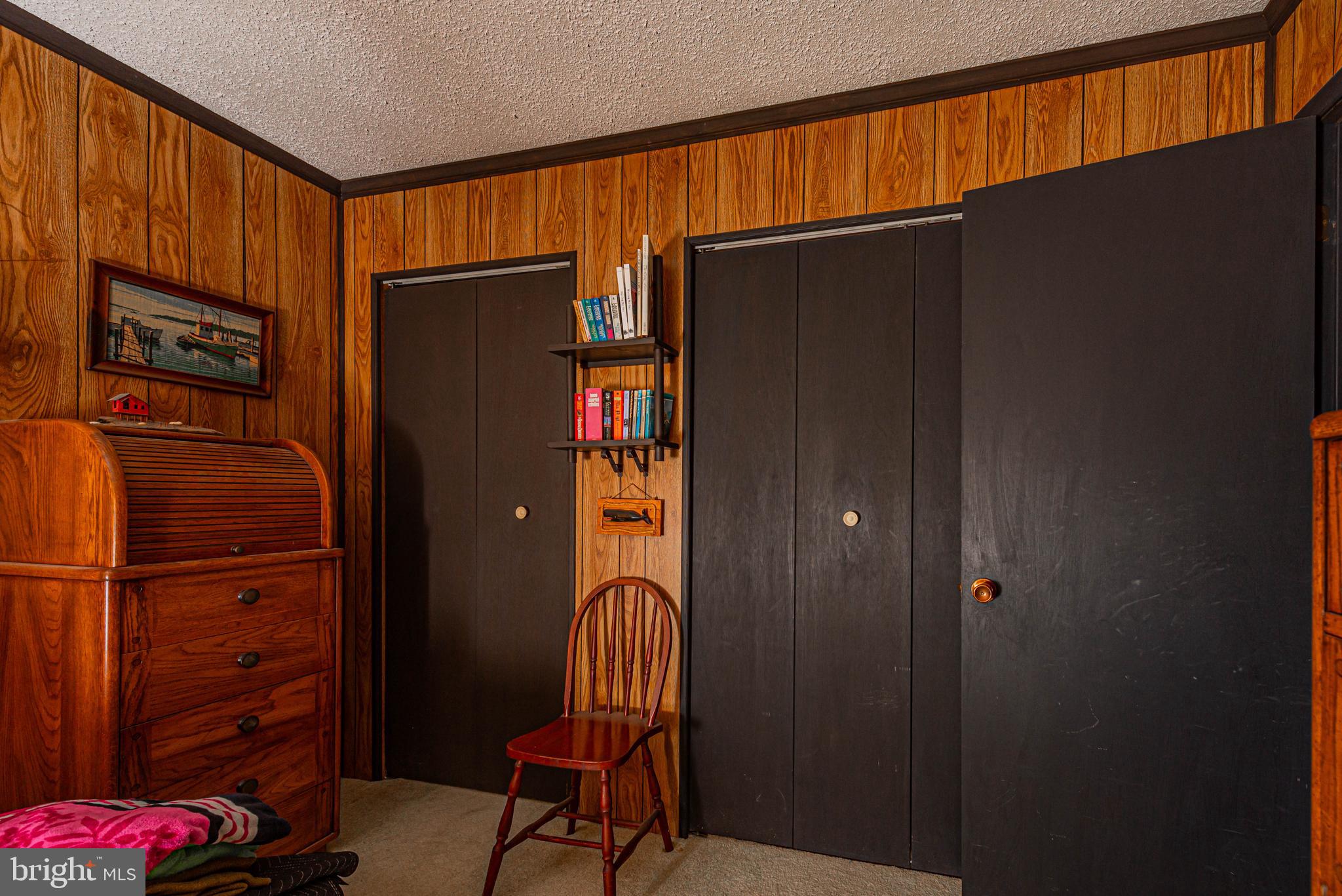 10602 Pine Needle Road Ocean City, MD 21842 - Photo 19 of 36 a room with windows and closet
