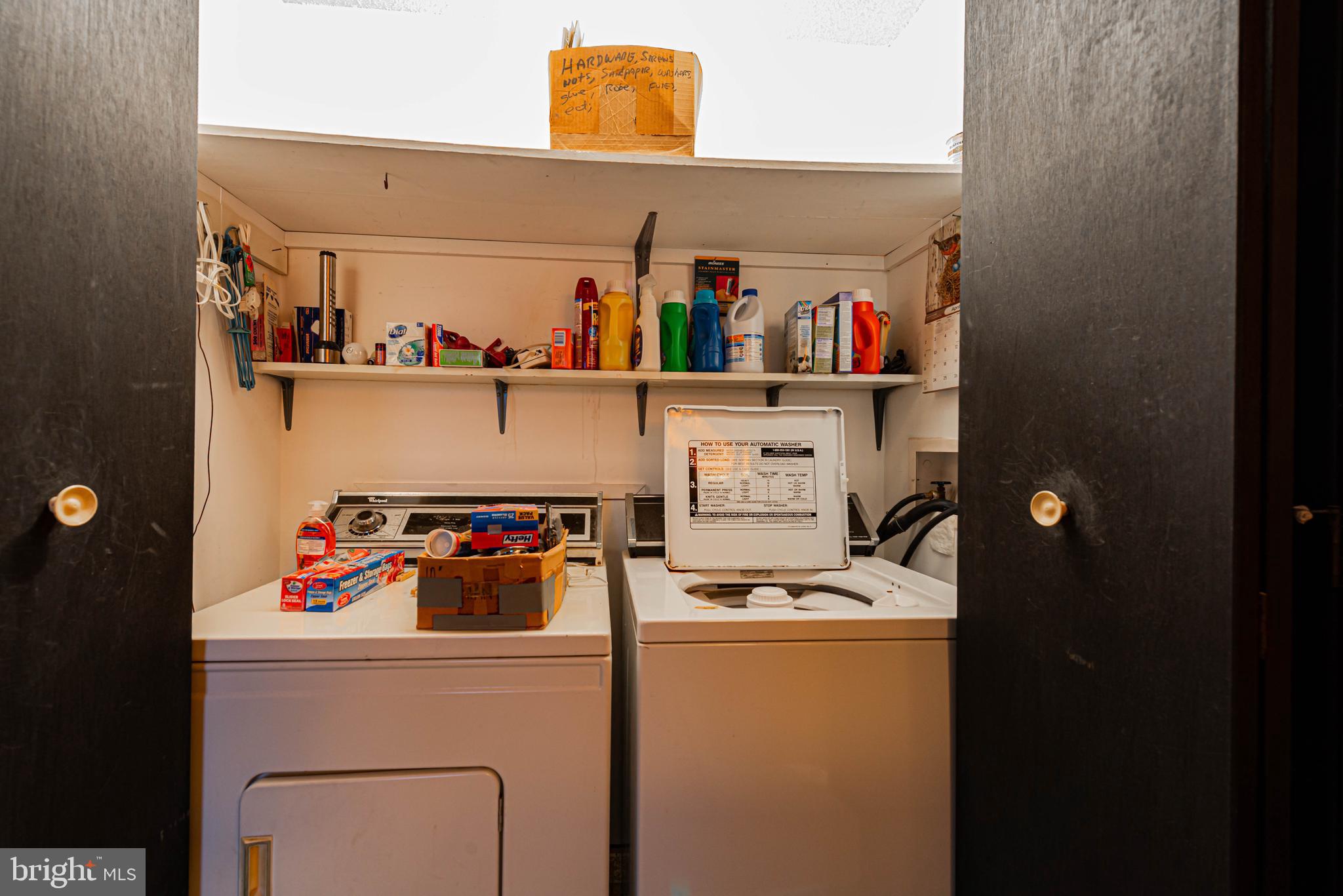 10602 Pine Needle Road Ocean City, MD 21842 - Photo 20 of 36 a utility room with dryer and washer