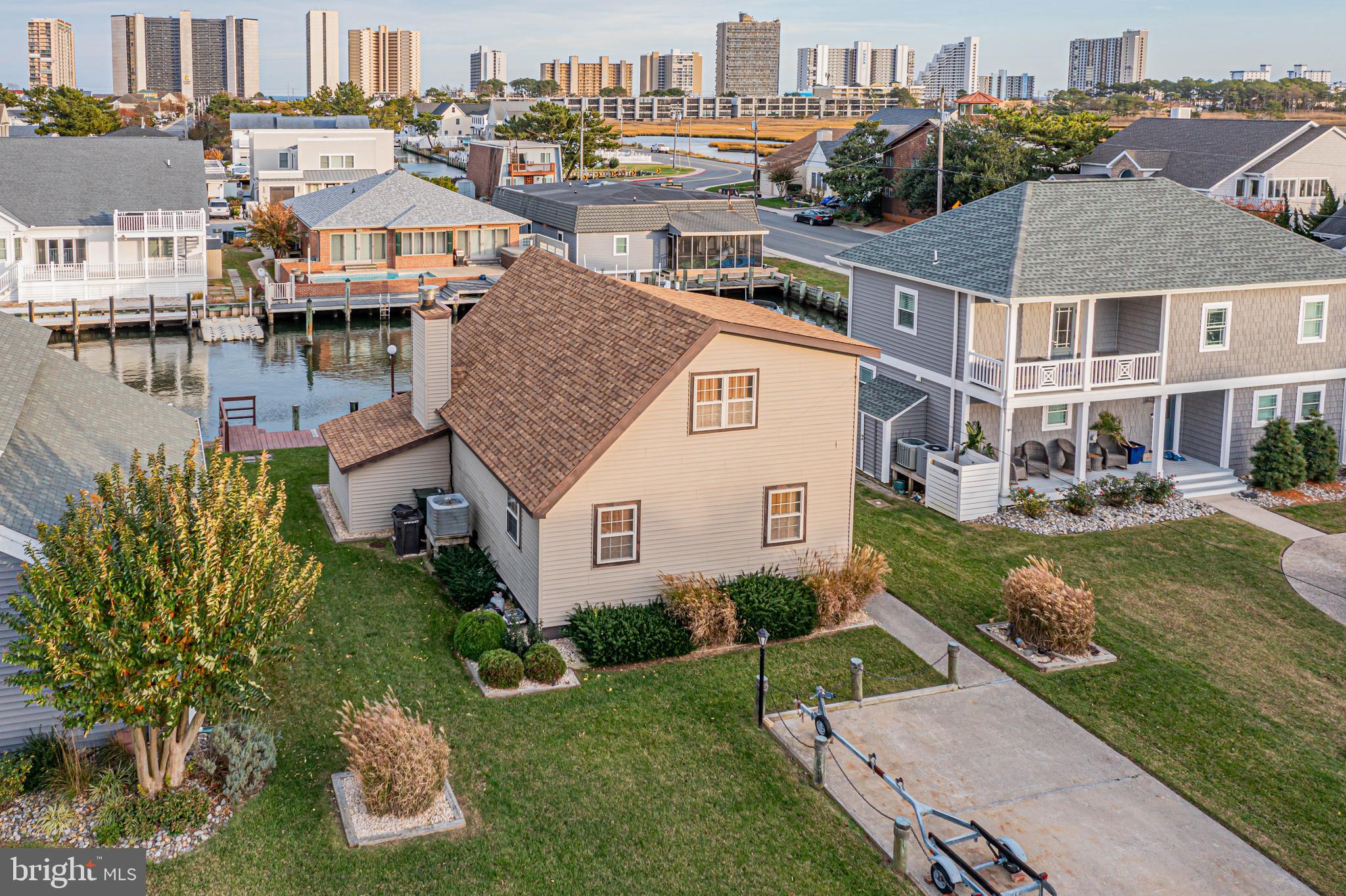 10602 Pine Needle Road Ocean City, MD 21842 - Photo 24 of 36 a aerial view of a house with a yard table and chairs