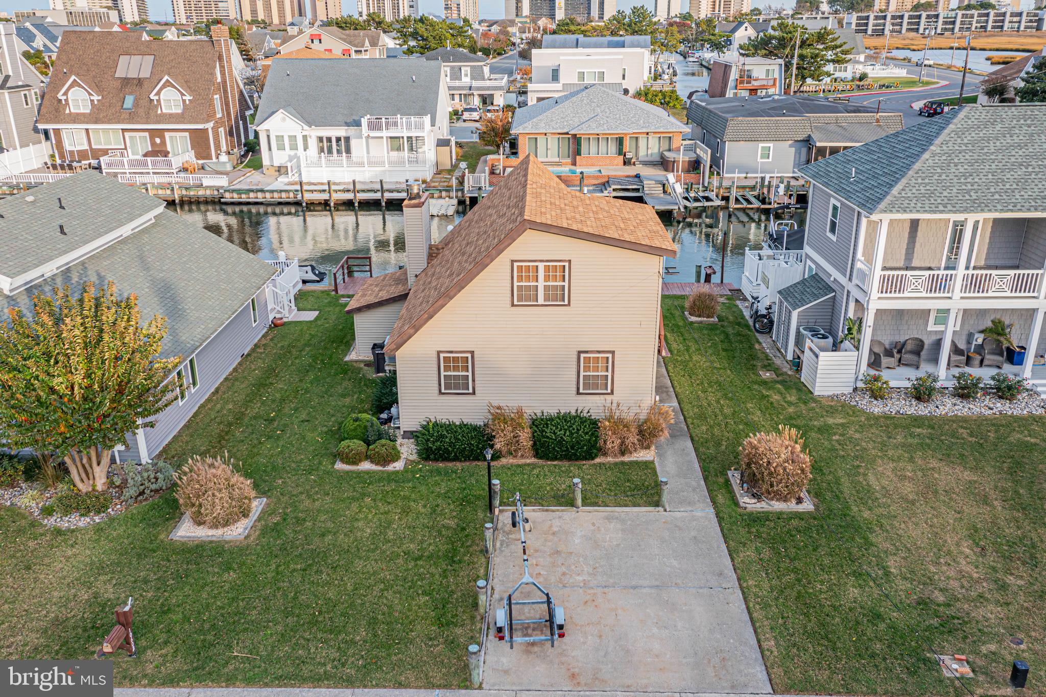 10602 Pine Needle Road Ocean City, MD 21842 - Photo 25 of 36 a aerial view of a house with a yard and potted plants