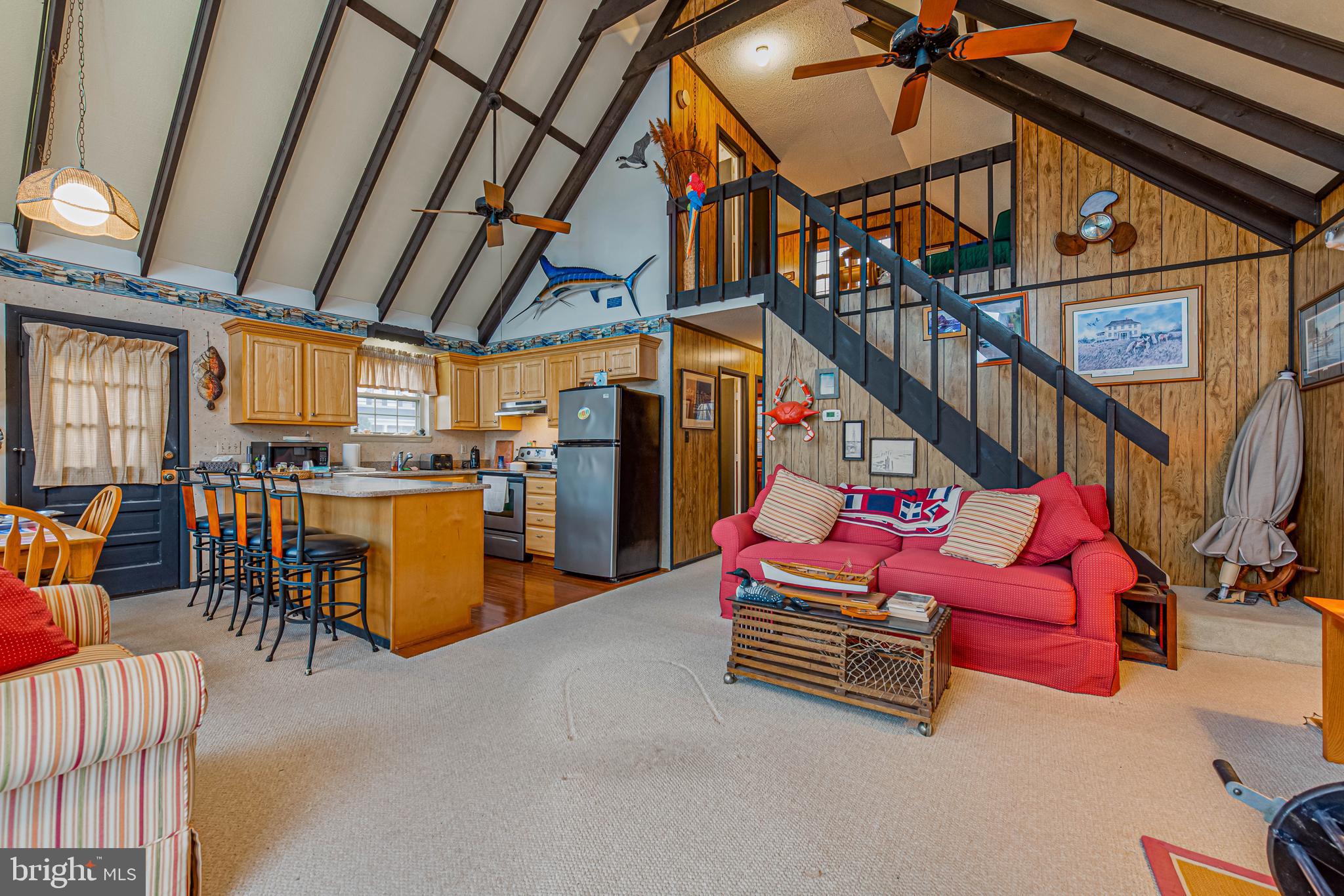 10602 Pine Needle Road Ocean City, MD 21842 - Photo 7 of 36 a outdoor space with lots of chairs