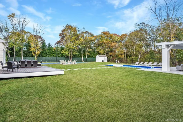 a view of a park with large trees