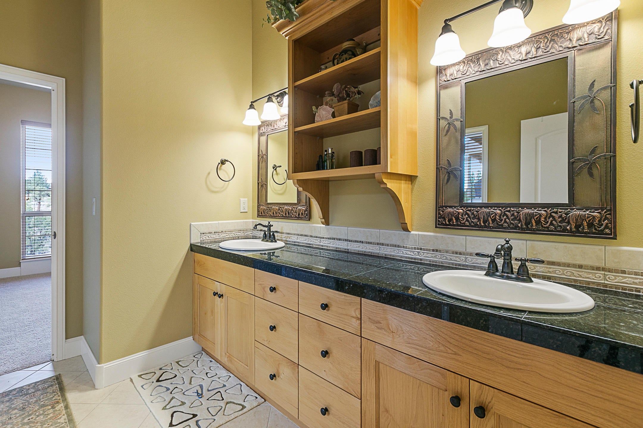 537 Highland Meadow Loop Redmond, OR 97756 - Photo 25 of 35 Jack and Jill Bathroom - view into Bedroom 3