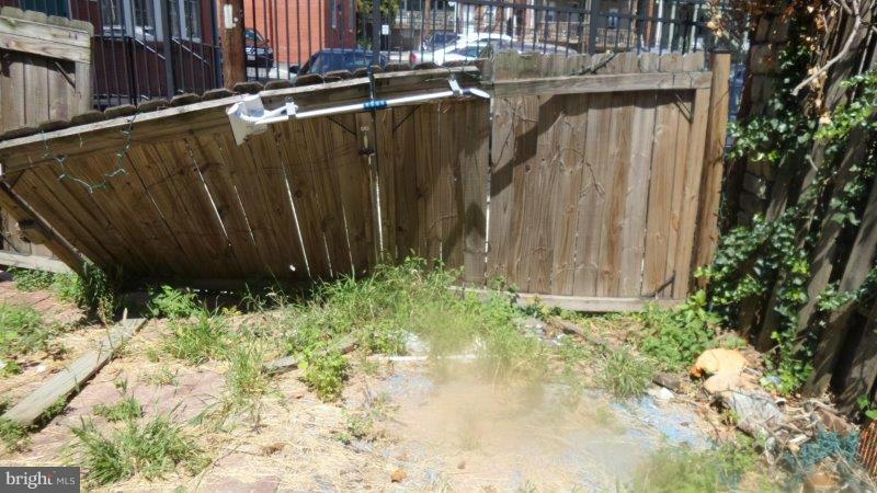 216 East Biddle Street Baltimore, MD 21202 - Photo 6 of 8 a view of a backyard of the house